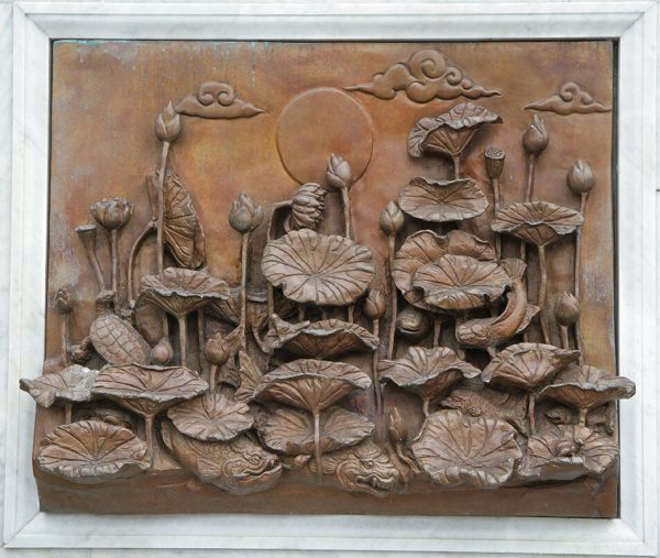 Lotus carving decorated on the wall at temple in Bangkok,Thailand.