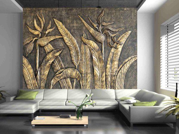 the sculpture of bird of paradise on wall