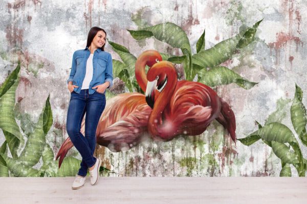 Painted flamingos in tropical leaves on a textured shabby background
