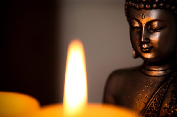 Buddha statue and candle light - Image 2