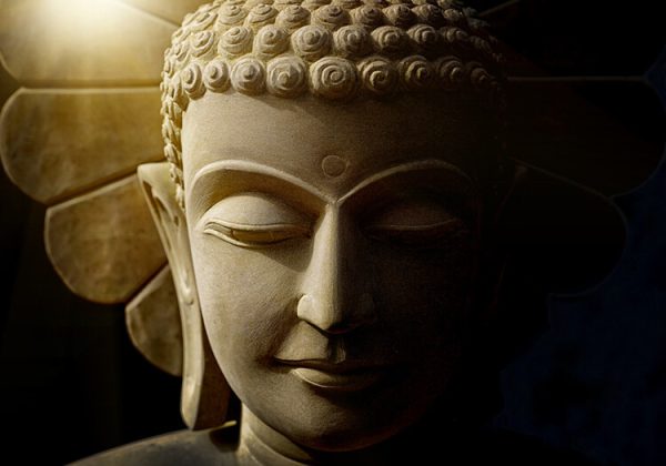 Buddha's head statue carved from sandstone by handmade