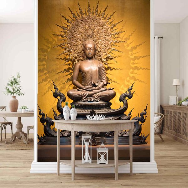 Golden Buddha sculpture in lotus position sitting on an orange background - Image 3