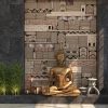 Home decor with a gold statue of Buddha against a black wall with an ethnic pattern of stones - Image 2