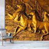 Golden Horses sculptures on the wall - Image 2