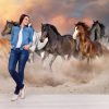 Horse herd run gallop in desert dust against dramatic sky - Image 3