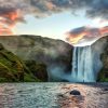 Impressive scenery of the majestic Muskogee Waterfall of Iceland during sunrise. Amazing landscape with dramatic picturesque sky. Iceland the most beautiful and best travel place. Beauty of World - Image 3